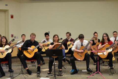 Picture of Dr. Kevin Vigil and students from Heritage High School